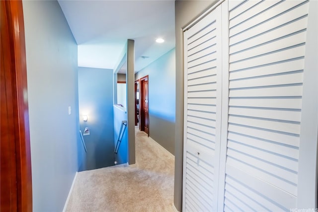 87-107 Kulaaupuni St Unit 2, Waianae, HI 96792 - hall with an upstairs landing and carpet flooring