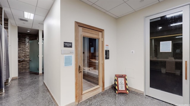 1108 Auahi St Unit 3201, Honolulu, HI 96814 - hallway featuring a drop ceiling and baseboards