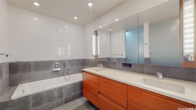 1108 Auahi St Unit 3201, Honolulu, HI 96814 - bathroom featuring double vanity, a bath, recessed lighting, and tile patterned flooring