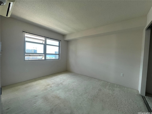 801 S St Unit 3603, Honolulu, HI 96813 - unfurnished room with carpet flooring and a textured ceiling