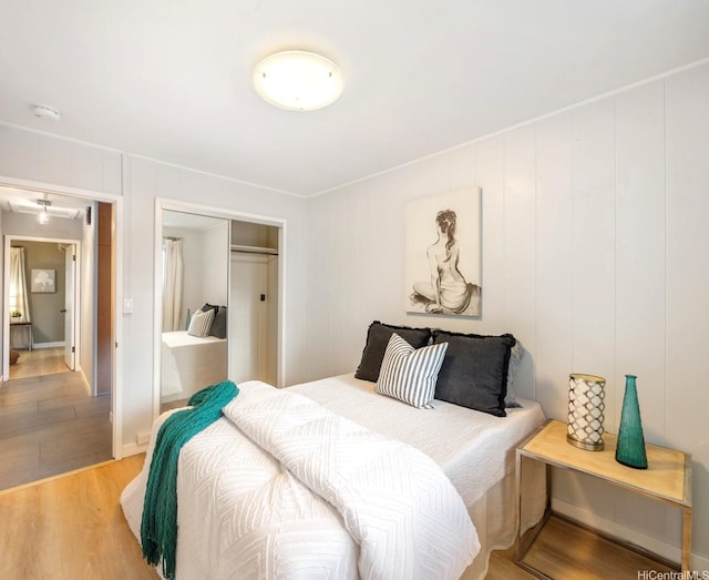 2527 Henry St Unit A, Honolulu, HI 96817 - bedroom featuring light wood-style floors and a closet