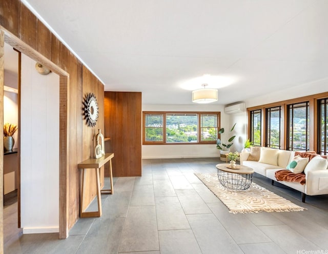 2527 Henry St Unit A, Honolulu, HI 96817 - living room featuring a wall mounted air conditioner and wood walls