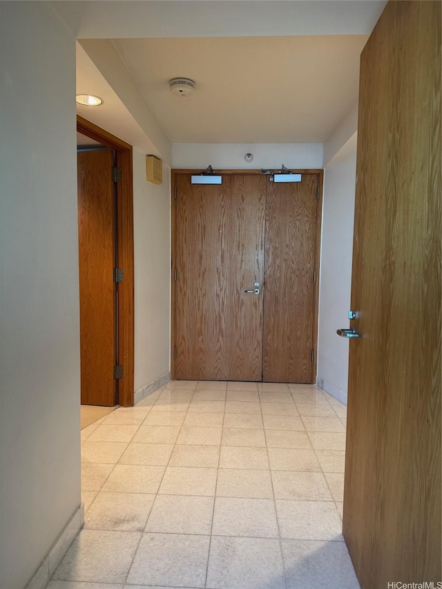 1330 Ala Moana Blvd Unit 2105, Honolulu, HI 96814 - corridor with light tile patterned floors and baseboards