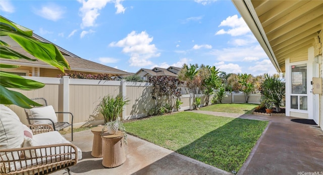91-994 Laaulu St Unit 33D, Ewa Beach, HI 96706 - fenced backyard with a patio area and an outdoor hangout area