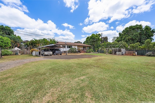 66-342-A Aukai Ln Unit 2, Haleiwa, HI 96712 - view of yard with a carport and driveway