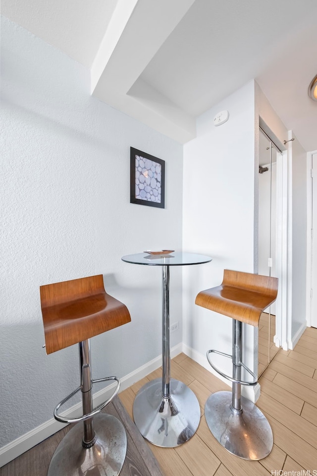 445 Seaside Ave Unit 3203, Honolulu, HI 96815 - dining space featuring wood finished floors and baseboards