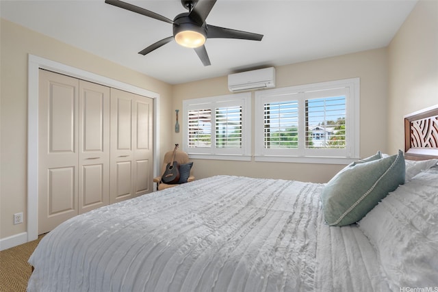 66-158A Haleiwa Rd, Haleiwa, HI 96712 - carpeted bedroom with a wall mounted AC, a closet, ceiling fan, and baseboards