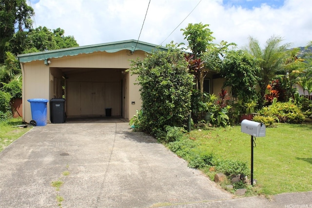 45-610 Kipawale Pl, Kaneohe, HI 96744 - view of front of property with driveway, a front lawn, and a carport