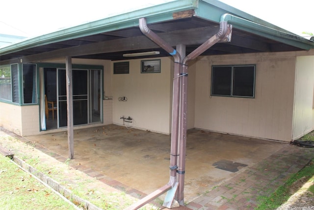 45-610 Kipawale Pl, Kaneohe, HI 96744 - back of property with a patio area and an attached carport