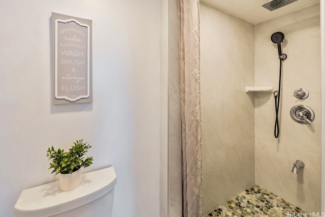 469 Ena Rd Unit 2004, Honolulu, HI 96815 - bathroom with tiled shower and toilet