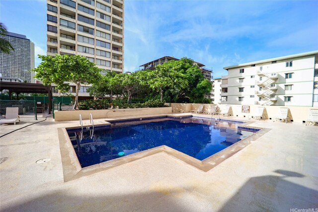430 Lewers St Unit 2502, Honolulu, HI 96815 - community pool featuring a patio