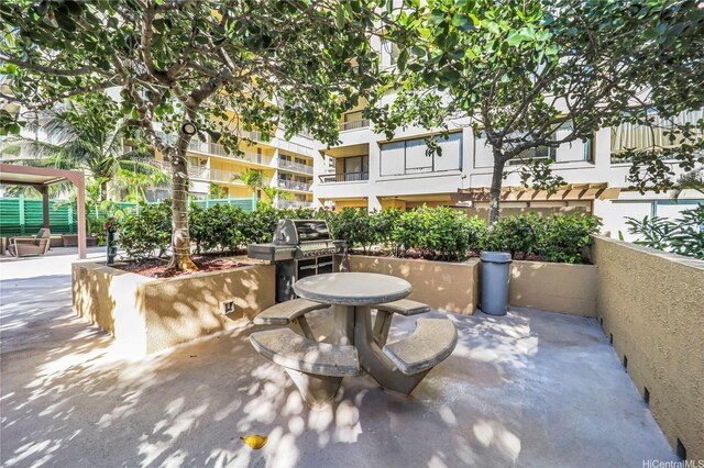 430 Lewers St Unit 2502, Honolulu, HI 96815 - view of patio / terrace featuring a grill