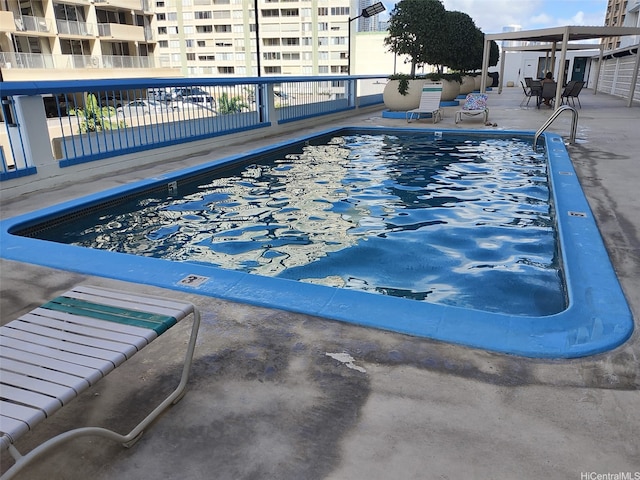 1560 Kanunu St Unit 1316, Honolulu, HI 96814 - community pool with a patio