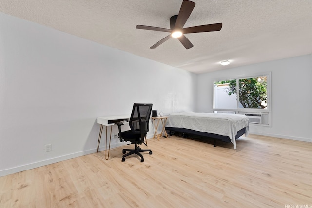 1305 Lunalilo Home Rd, Honolulu, HI 96825 - bedroom with a textured ceiling, wood finished floors, baseboards, and ceiling fan