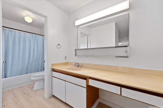 1305 Lunalilo Home Rd, Honolulu, HI 96825 - bathroom featuring toilet, vanity, wood finished floors, and shower / tub combo