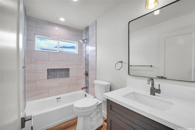 45-420 Pua Makahala St, Kaneohe, HI 96744 - bathroom with vanity, shower / bathtub combination, wood finished floors, and recessed lighting