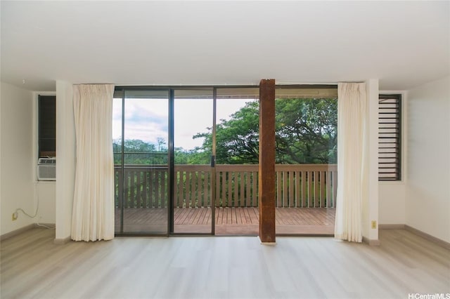 84-757 Kiana Pl Unit 6/21A, Waianae, HI 96792 - entryway with expansive windows and wood finished floors