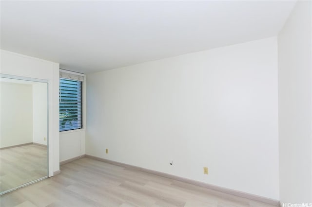 84-757 Kiana Pl Unit 6/21A, Waianae, HI 96792 - unfurnished bedroom with light wood-style floors and a closet