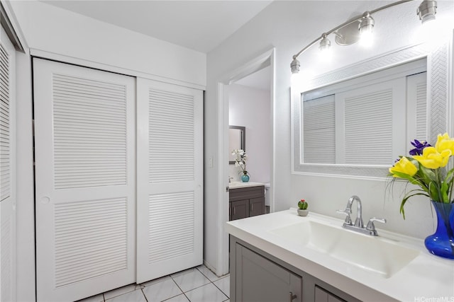 94-1183 Kipaa Pl Unit 14C, Waipahu, HI 96797 - bathroom with a closet, vanity, and tile patterned floors