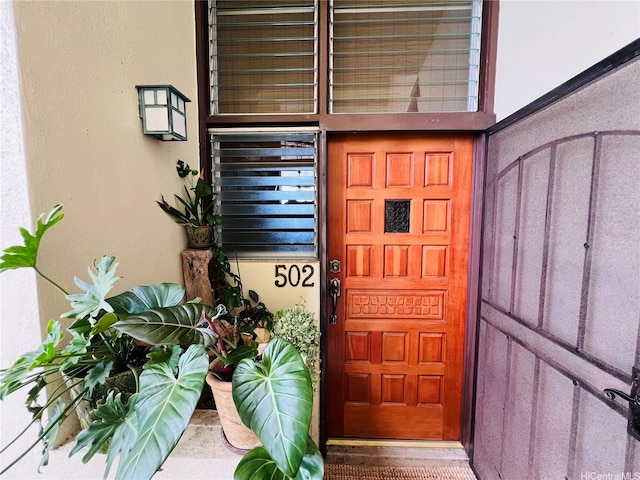 666 Prospect St Unit I502, Honolulu, HI 96813 - view of exterior entry with stucco siding