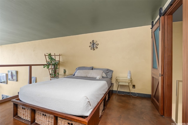 666 Prospect St Unit I502, Honolulu, HI 96813 - bedroom with a barn door and finished concrete floors