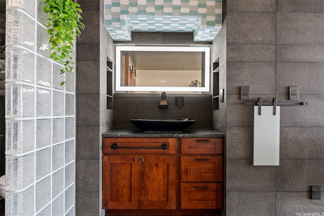 666 Prospect St Unit I502, Honolulu, HI 96813 - bathroom with vanity and tile walls