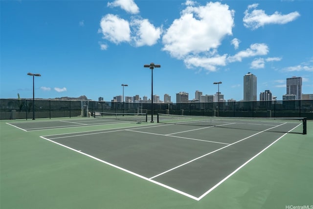 583 Kamoku St Unit Ph7, Honolulu, HI 96826 - view of tennis court with a view of skyline