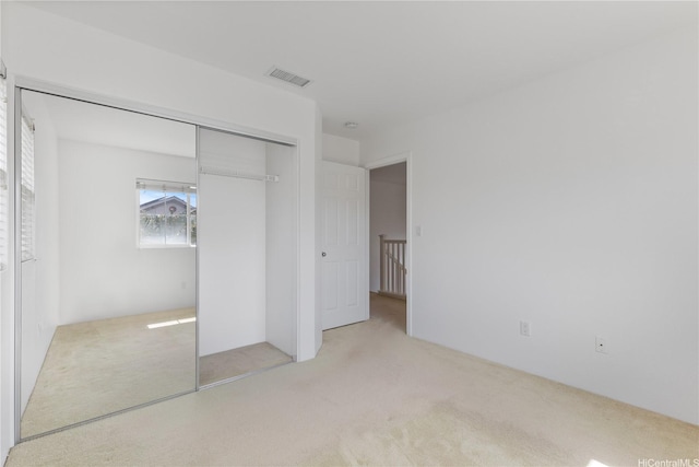 91-1022 Kaikauhaa St, Ewa Beach, HI 96706 - unfurnished bedroom with light carpet and a closet