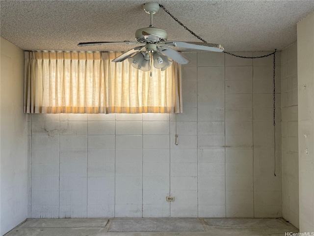 2115 Ala Wai Blvd Unit 1205, Honolulu, HI 96815 - empty room with a ceiling fan, unfinished concrete flooring, and a textured ceiling