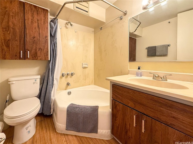 445 Seaside Ave Unit 1120, Honolulu, HI 96815 - bathroom with vanity, toilet, shower / bath combo with shower curtain, and wood finished floors