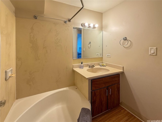 445 Seaside Ave Unit 1120, Honolulu, HI 96815 - full bath with a tub to relax in, vanity, and wood finished floors