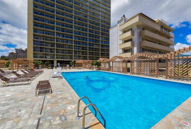 445 Seaside Ave Unit 1120, Honolulu, HI 96815 - community pool with a patio