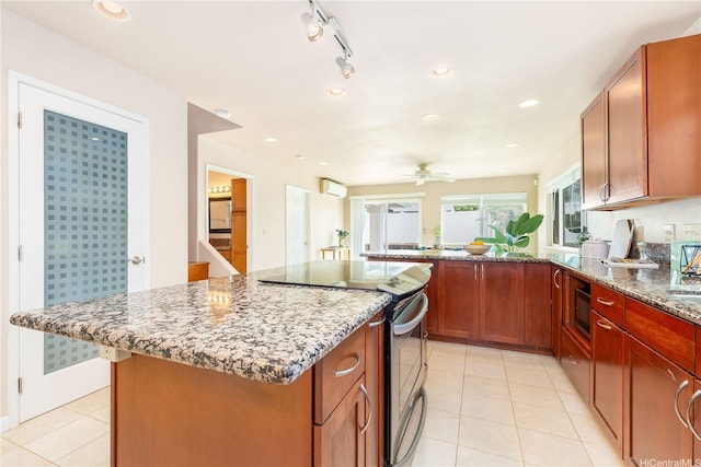 91-2106B Fort Weaver Rd Unit 15, Ewa Beach, HI 96706 - kitchen with stainless steel electric stove, stone counters, ceiling fan, light tile patterned floors, and recessed lighting