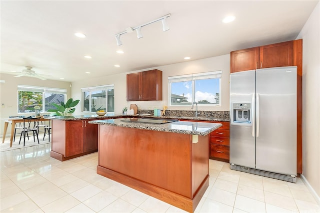91-2106B Fort Weaver Rd Unit 15, Ewa Beach, HI 96706 - kitchen with stainless steel fridge with ice dispenser, a kitchen island, dark stone counters, black electric cooktop, and recessed lighting