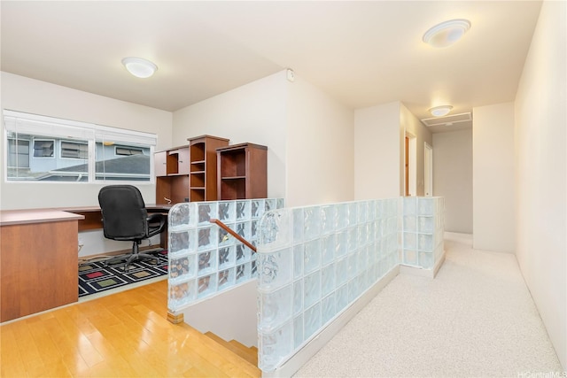 91-2106B Fort Weaver Rd Unit 15, Ewa Beach, HI 96706 - hallway featuring an office area and wood finished floors