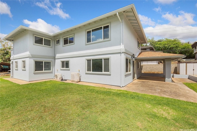 91-2106B Fort Weaver Rd Unit 15, Ewa Beach, HI 96706 - back of property with stucco siding and a patio area