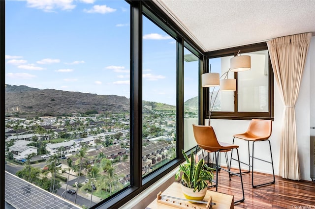 250 Kawaihae St Unit 10E, Honolulu, HI 96825 - sunroom / solarium featuring a mountain view