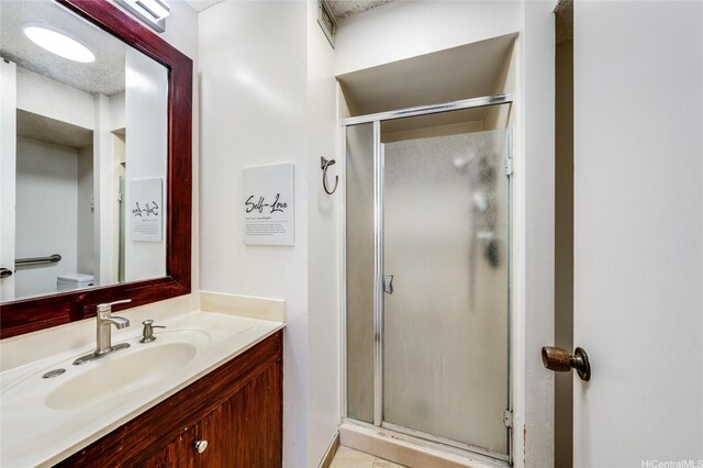 250 Kawaihae St Unit 10E, Honolulu, HI 96825 - full bath with vanity and a stall shower