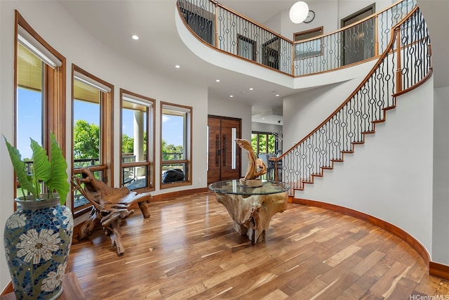 4967 Maunalani Cir Unit B, Honolulu, HI 96816 - foyer featuring baseboards, wood finished floors, stairs, recessed lighting, and a towering ceiling