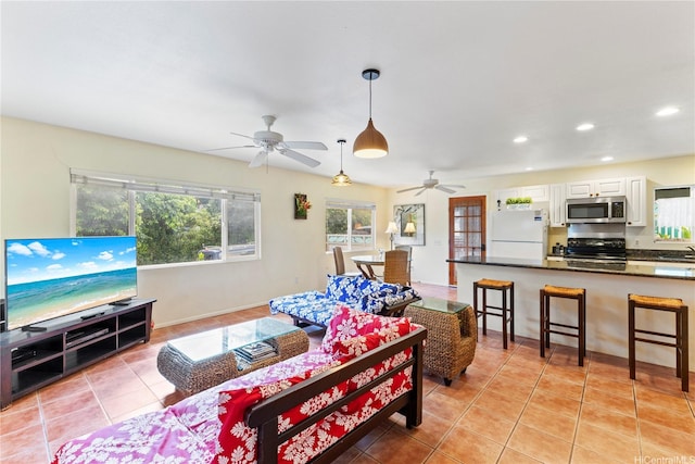 58-292 Kamehameha Hwy, Haleiwa, HI 96712 - living area with light tile patterned floors, recessed lighting, and ceiling fan
