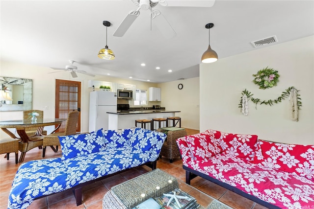 58-292 Kamehameha Hwy, Haleiwa, HI 96712 - living room with ceiling fan, light tile patterned floors, and recessed lighting