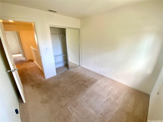 91-1008 Kaiopua St Unit M2, Ewa Beach, HI 96706 - unfurnished bedroom with carpet and a closet
