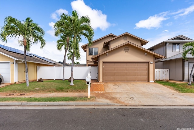 91-1041 Waihuna St, Ewa Beach, HI 96706 - traditional-style home with driveway and an attached garage