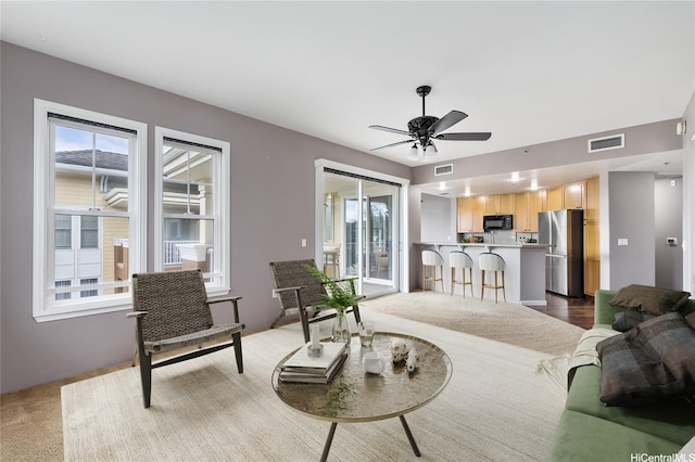 520 Lunalilo Home Rd Unit 7427, Honolulu, HI 96825 - living area featuring plenty of natural light and ceiling fan