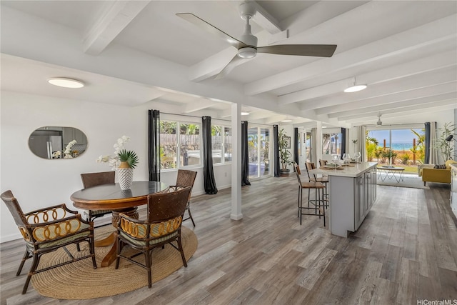 86-94 Pokai Bay St, Waianae, HI 96792 - dining area featuring ceiling fan, beam ceiling, and light wood finished floors
