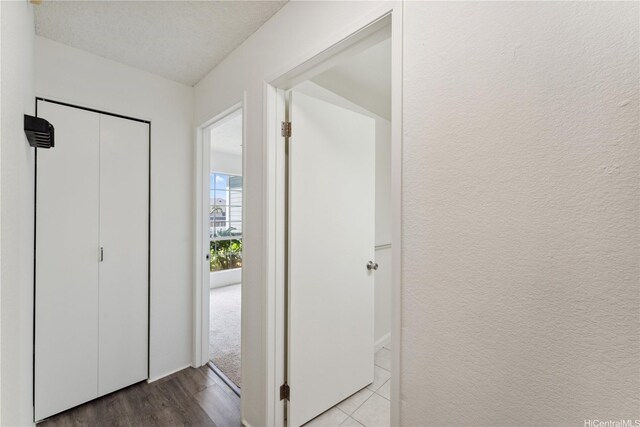 94-1467 Waipio Uka St Unit T103, Waipahu, HI 96797 - hallway with wood finished floors