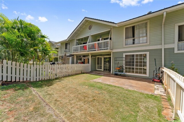 94-1467 Waipio Uka St Unit T103, Waipahu, HI 96797 - back of property featuring a balcony and a patio area