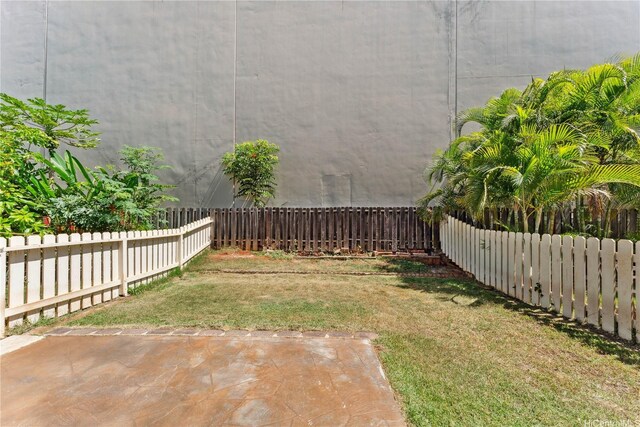 94-1467 Waipio Uka St Unit T103, Waipahu, HI 96797 - view of yard featuring a patio area