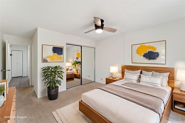 94-1467 Waipio Uka St Unit T103, Waipahu, HI 96797 - carpeted bedroom with a closet and a ceiling fan