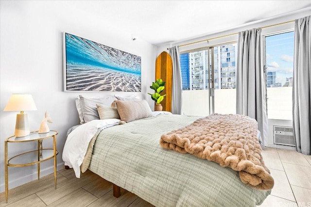 2463 Kuhio Ave Unit 1109, Honolulu, HI 96815 - bedroom with access to outside and a wall unit AC
